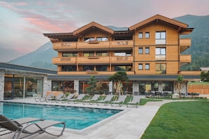 Outdoor pool, open 9:30 AM to 7:00 PM, pool umbrellas, sun loungers