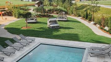 Outdoor pool, open 9:30 AM to 7:00 PM, pool umbrellas, sun loungers