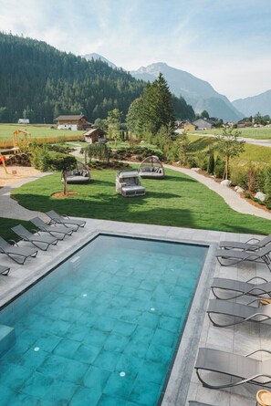 Outdoor pool, open 9:30 AM to 7:00 PM, pool umbrellas, sun loungers - Boutiquehotel Acherl (Achenkirch)