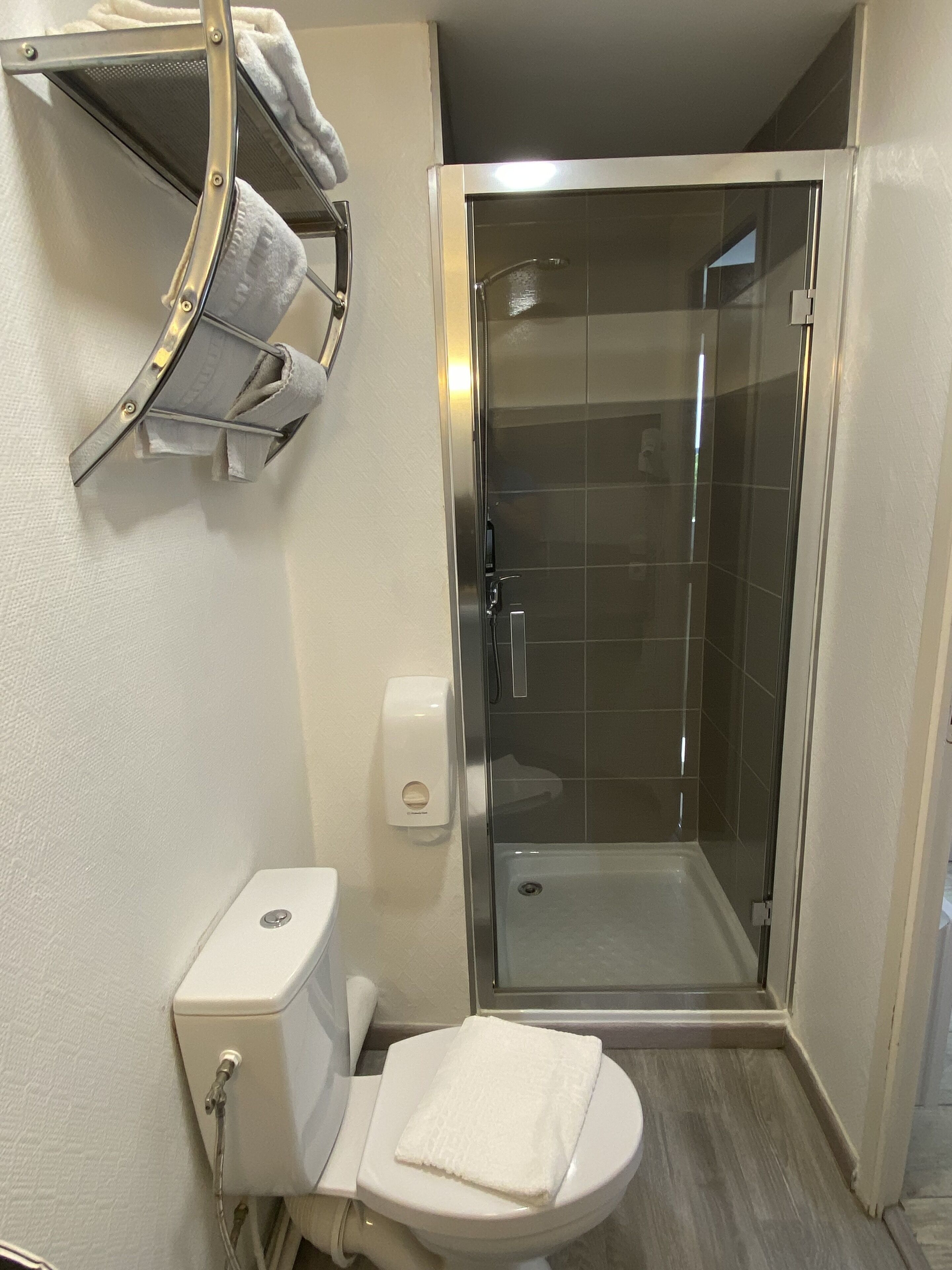 comfort twin room | bathroom | shower, rainfall showerhead, towels