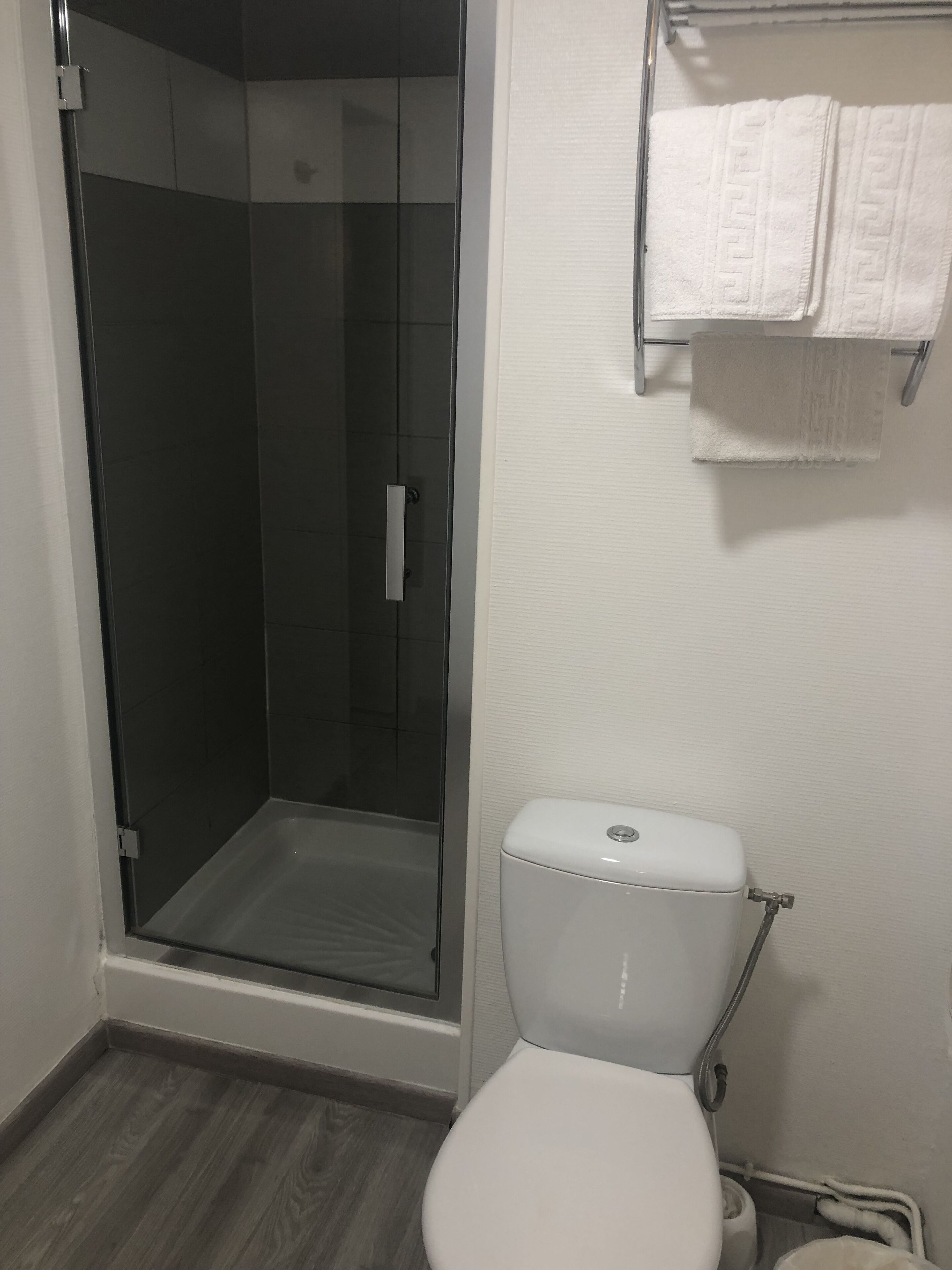 shower, rainfall showerhead, towels