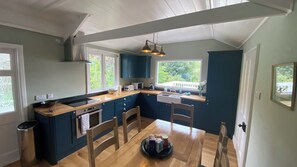 Fridge, oven, cookware/dishes/utensils