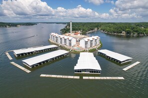 A floating hotel with multiple levels, connected by walkways, and surrounded by water. - Isla Del Sol 105 - Condo with epic views (Rocky Mount)