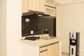 Departamento, 2 habitaciones | Cocina privada | Refrigerador y utensilios de cocina 