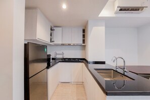 Apartemen, 2 kamar tidur | Dapur pribadi | Lemari es dan peralatan masak/sendok-piring