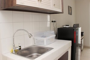 Appartement | Cuisine privée | Réfrigérateur, vaisselle et ustensiles