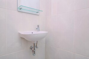 Departamento | Baño | Toallas y shampoo 