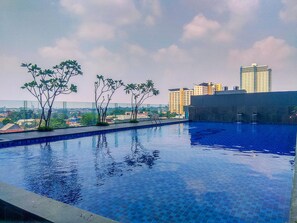Pool - Cozy And Simply Studio At Evenciio Margonda Apartment (Depok)