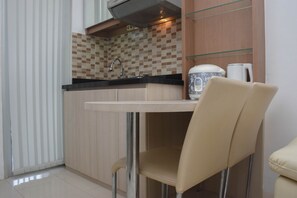 Dining room - Cozy Stay And Comfort 2Br At Bassura Apartment (Jakarta)