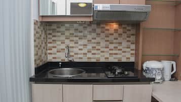 Departamento, 2 habitaciones | Cocina privada | Refrigerador y utensilios de cocina