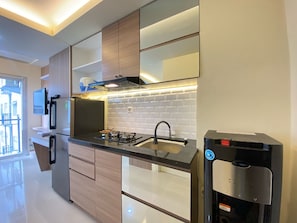 Apartamento | Cocina privada | Frigorífico y utensilios de cocina