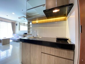 Private kitchen - Relaxing 2Br At Gateway Pasteur Apartment (Cimahi)