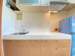 Apartamento | Cocina privada | Frigorífico y utensilios de cocina