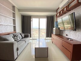 Apartment, 2 Bedrooms | Living area | TV