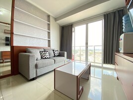 Apartment, 2 Bedrooms | Living area | TV