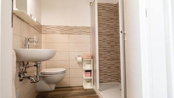 Regadera, secadora de cabello, bidet