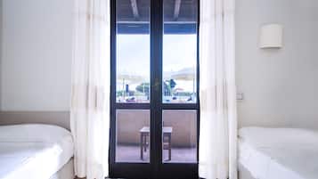 Family Quadruple Room | 1 bedroom, minibar, in-room safe, desk
