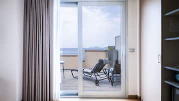 Superior Suite | Living area | 20-inch LCD TV with cable channels, TV