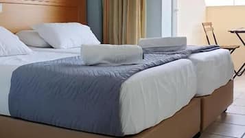 Quadruple Room | In-room safe, soundproofing, free WiFi, bed sheets