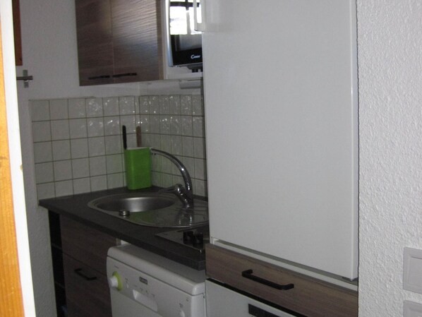 Refrigerador, microondas, horno y lavavajillas 