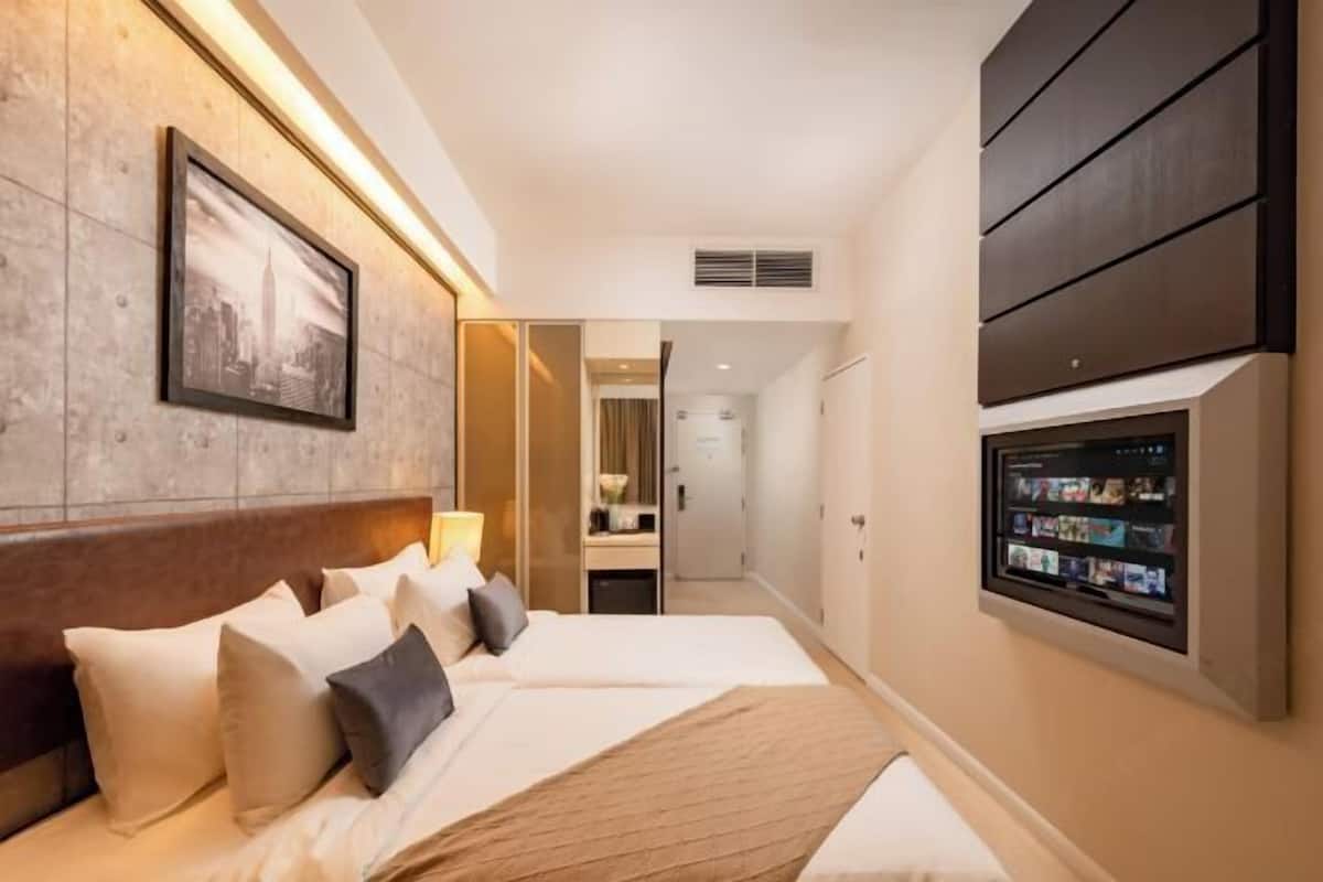 1 quarto, edredons de pluma, frigobar, cortinas blackout