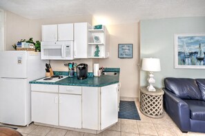 Fridge, microwave, coffee/tea maker, toaster