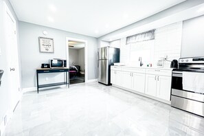 Fridge, microwave, cookware/dishes/utensils