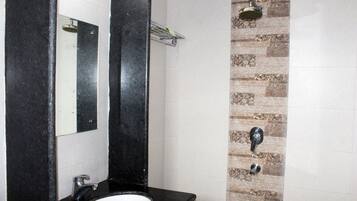 Deluxe Room, 1 Bedroom | Bathroom | Shower, free toiletries, towels, soap