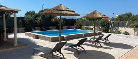 Piscine extérieure, piscine chauffée