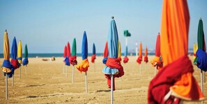 On the beach, sun loungers