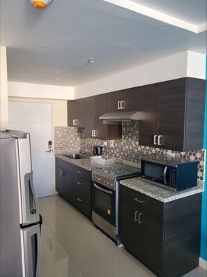 Apartment | Private kitchen | Fridge, microwave, oven, stovetop