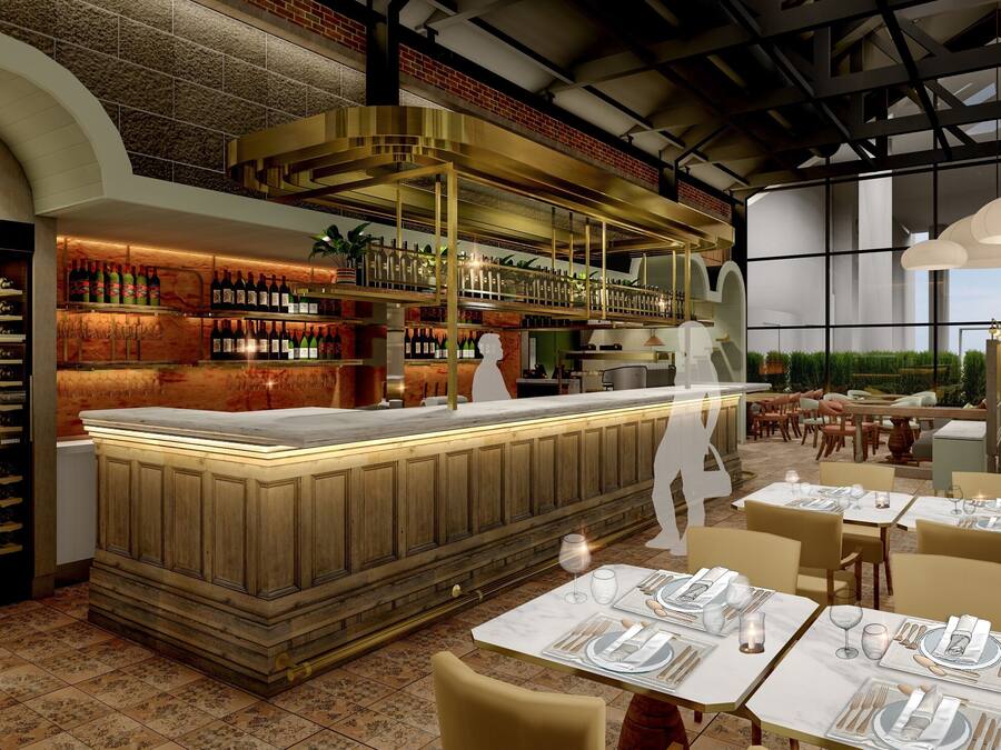 A modern bar area with a wooden counter, wine bottles, and a seating area with tables and chairs.