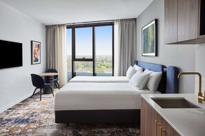 Ropa de cama de alta calidad y minibar 