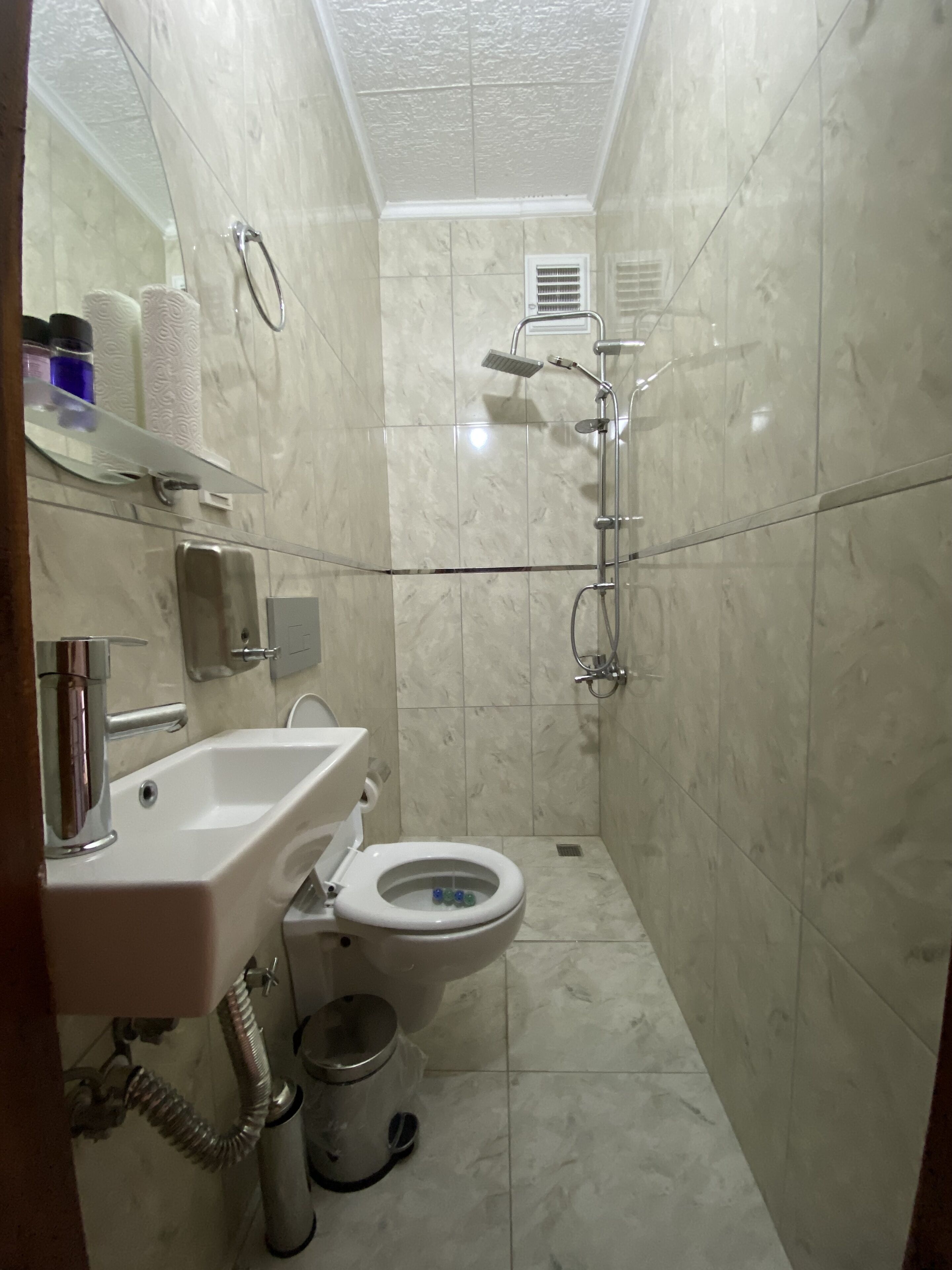 Room | Bathroom | Shower, rainfall showerhead, hair dryer, towels