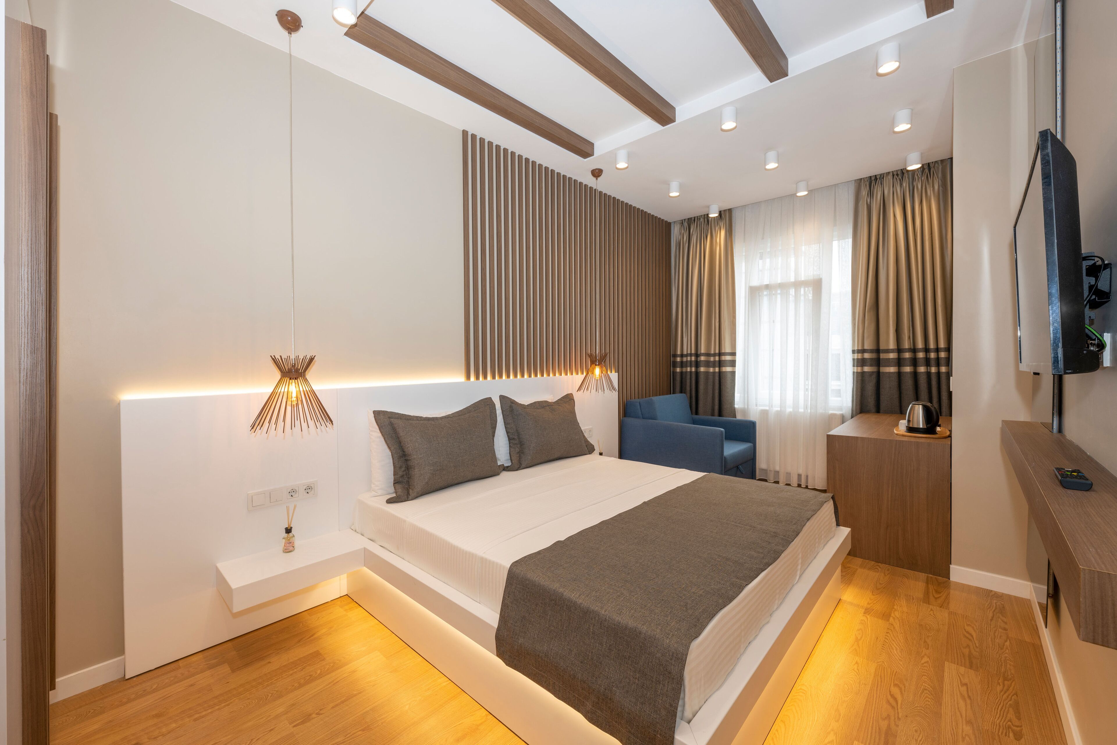 Deluxe tweepersoonskamer | Een gratis minibar, geluiddichte muren, gratis wifi, beddengoed