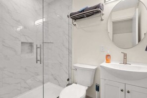 Shower, hair dryer, shampoo - NEW 1 Bed Front Street Suite 1 (Traverse City)