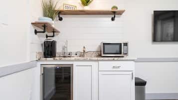 Microwave, coffee/tea maker, cookware/dishes/utensils