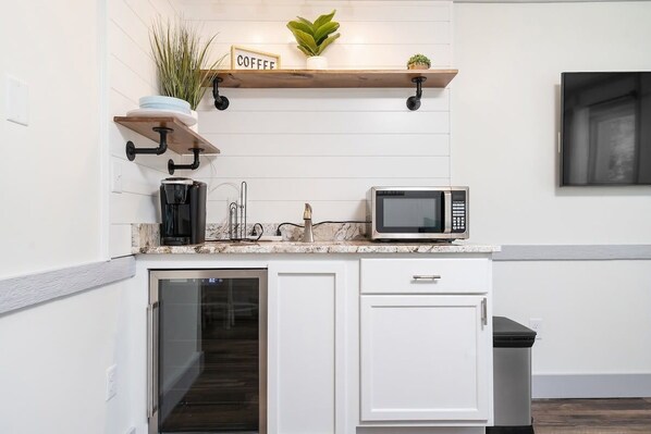 Microwave, coffee/tea maker, cookware/dishes/utensils