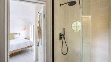 Bathtub, hair dryer, towels