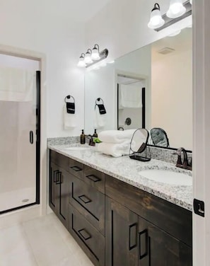 Shower, hair dryer, towels, soap