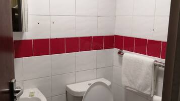 Traditional Quadruple Room | Bathroom | Shower, rainfall showerhead, towels, soap