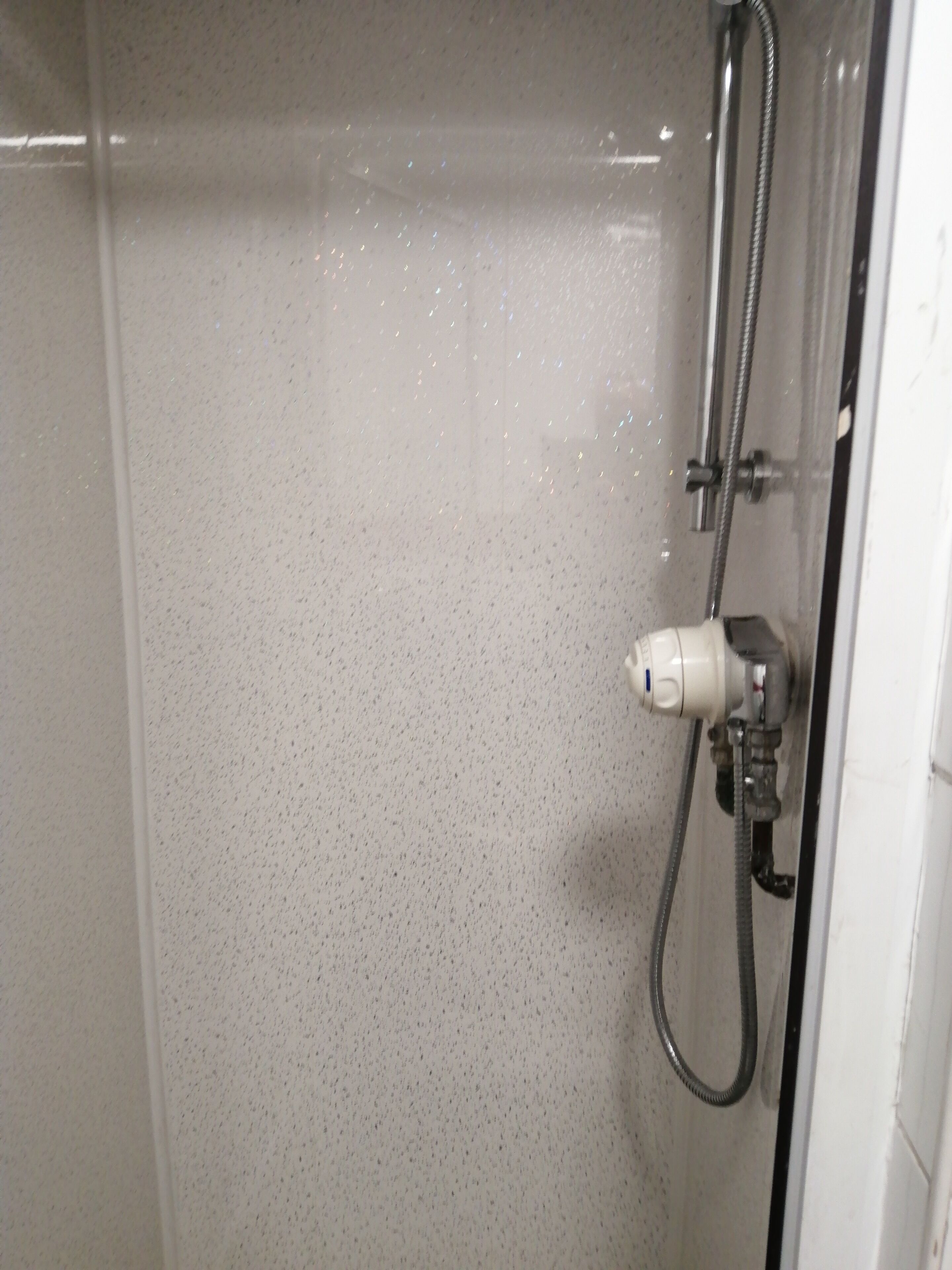 Shower, rainfall showerhead, towels, soap