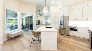 Fridge, microwave, stovetop, coffee/tea maker