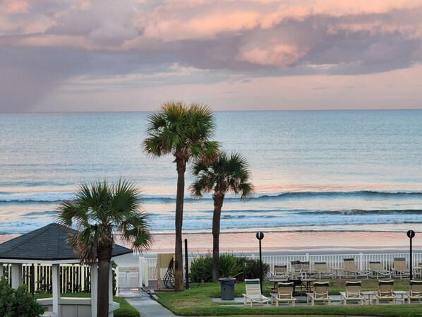 On the beach, sun loungers, beach towels