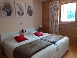1 slaapkamer, een strijkplank/strijkijzer, internet, beddengoed