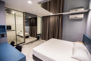 Estúdio luxo | Frigobar, escrivaninha, Wi-Fi de cortesia, roupa de cama