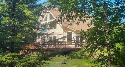Sunny coastal retreat with deck, grill, beach, dock, & ocean access