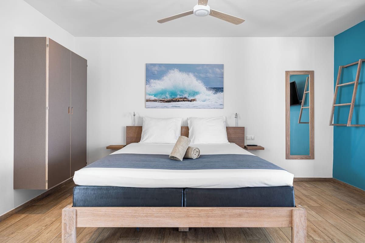 Deluxe Studio, Ocean View | In-room safe, iron/ironing board, free cots/infant beds, free WiFi