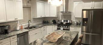Awesome 5 bed, 5 bath, heated pool - short walk to the beach!