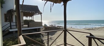 Beach loft hut with private steps onto the beach